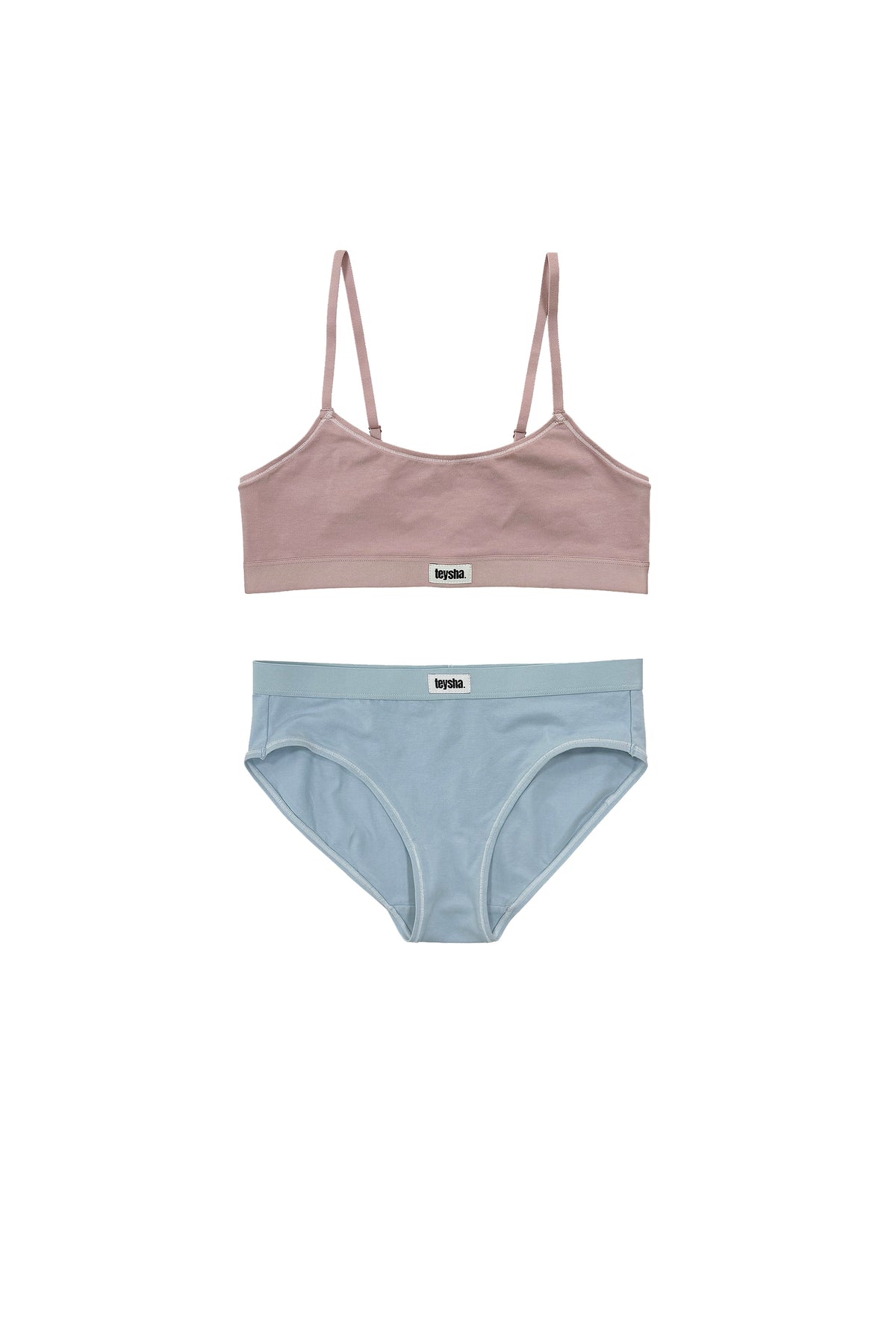 teysha organic cotton crop top bra in dusty pink and mid-rise brief in dusty blue, flat lay mixed set