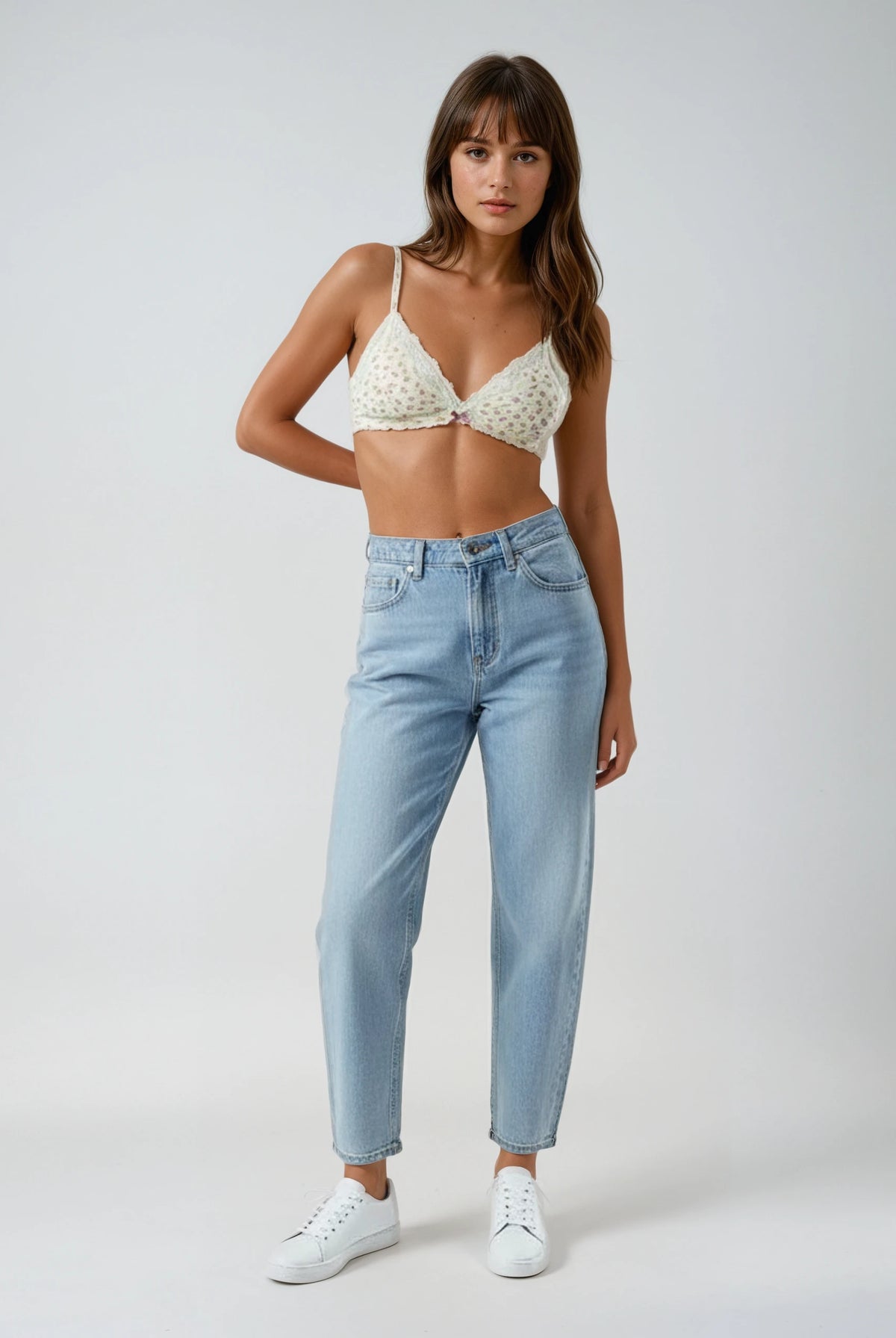 teysha organic cotton lace triangle bra in vintage rose floral print, on model styled with jeans