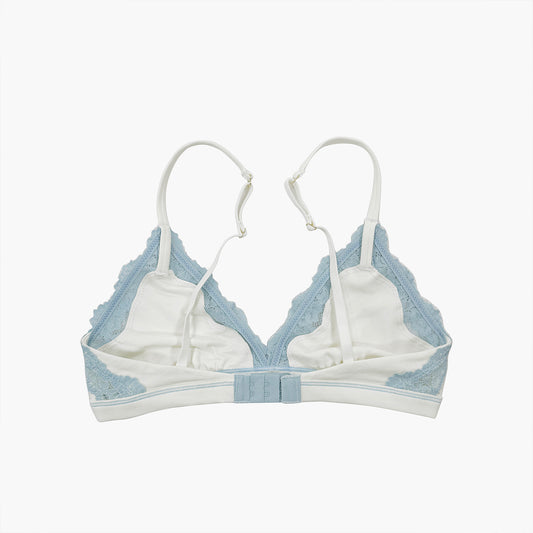 Teysha organic cotton triangle lace bra in winter sky, back view showing adjustable straps and hook closure — wire-free, GOTS-certified first bra for tween girls