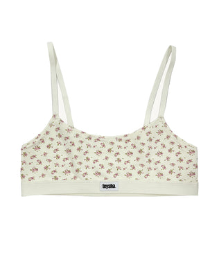 Teysha organic cotton crop top bra in vintage rose floral print, front view with Teysha logo band — wire-free, GOTS-certified first bra for tween girls