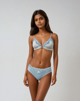 A model wearing Cotton Bikini With Lace in Dusty Blue