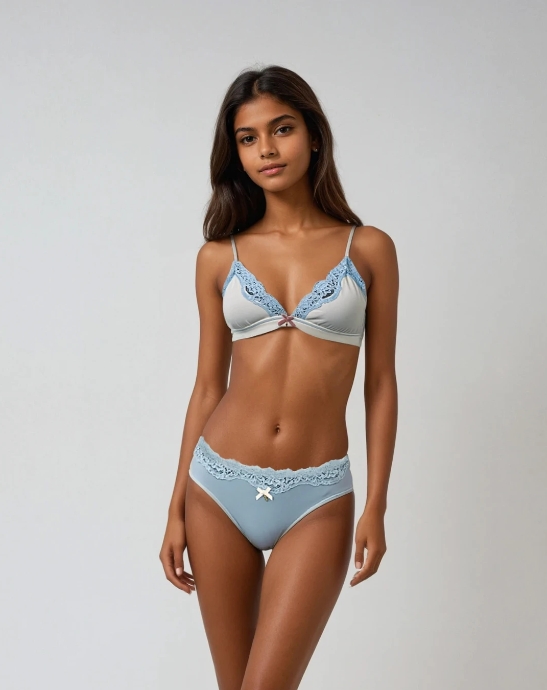 A model wearing Cotton Bikini With Lace in Dusty Blue
