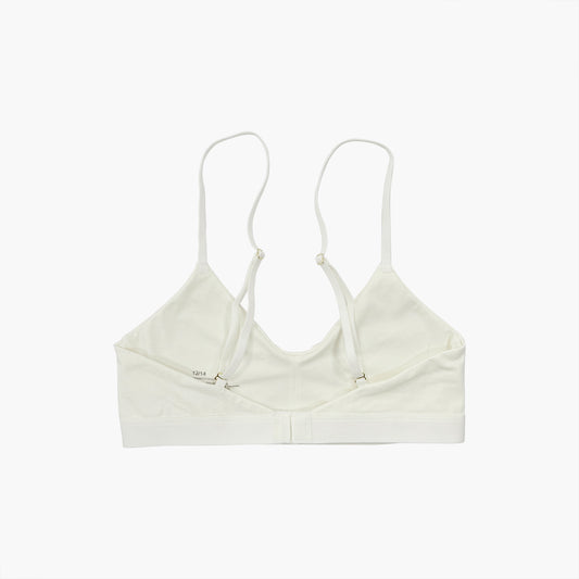 Teysha organic cotton soft cup bra in off-white, back view flat lay showing adjustable straps — wire-free, no padding, GOTS-certified first bra for tween girls