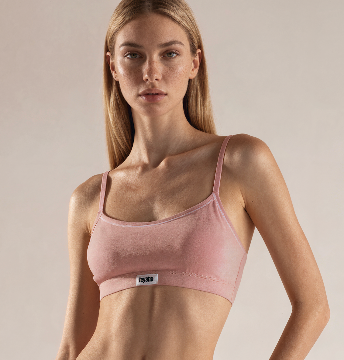 teysha organic cotton crop top bra in dusty pink, on model front view