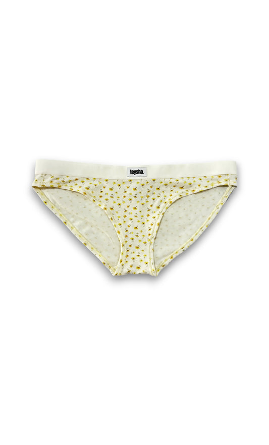 teysha organic cotton low-rise briefs in buttercup yellow print, flat lay – for tweens and teens