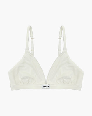 Teysha organic cotton triangle bra in cloud white, front view with Teysha logo band — wire-free, GOTS-certified first bra for tween girls