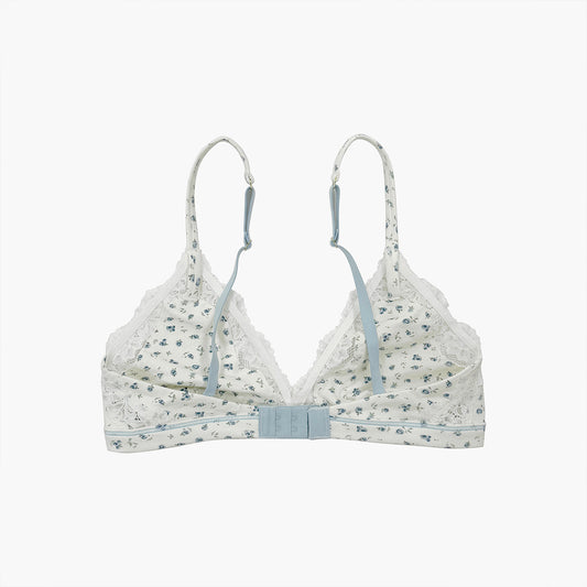 Teysha organic cotton triangle lace bra in ditsy floral print, back view showing adjustable straps — wire-free, GOTS-certified first bra for tween girls