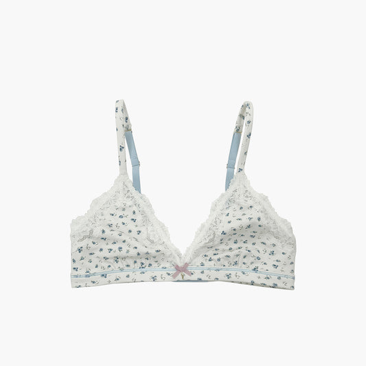 Teysha organic cotton lace triangle bra in ditsy floral print, flat lay front view — delicate lace trim, adjustable straps, wire-free, GOTS-certified first bra for tween girls