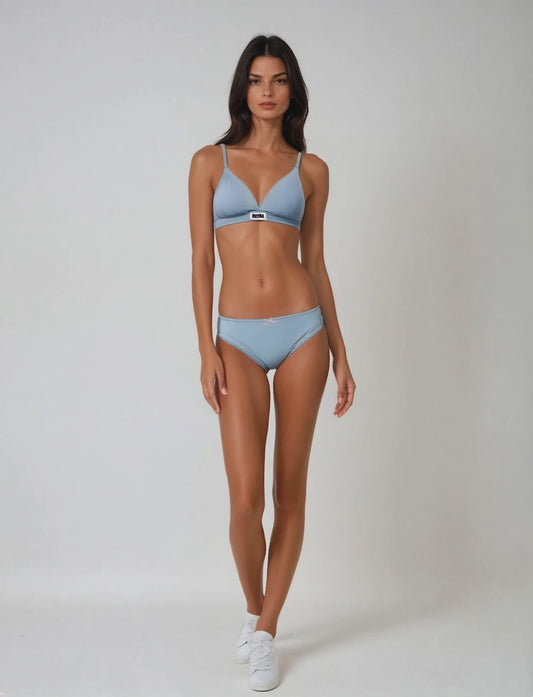 Teysha organic cotton triangle bra and matching picot edge bikini briefs in dusty blue, lifestyle video worn by model — wire-free, picot trim waistband, GOTS-certified first bra set for tween girls